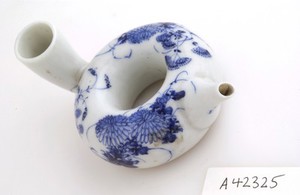 view Japanese porcelain feeding bottle, ring shaped
