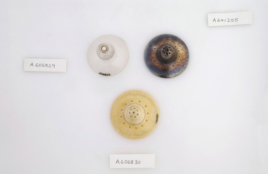 Sterling silver, ivory and glass nipple-shield. The silver one is hallmarked with the maker'd initials and George III's head and has been dated to 1786-1821