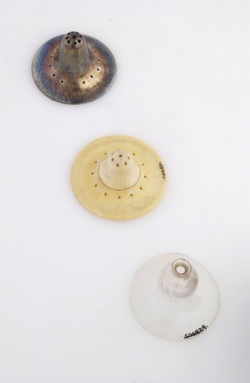 Sterling silver, ivory and glass nipple-shield. The silver one is hallmarked with the maker'd initials and George III's head and has been dated to 1786-1821