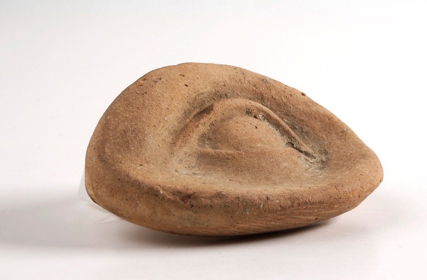 Votive right eye, terracotta, probably Roman, 200BC-200AD. 