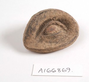 view A clay-baked eye. Roman votive offering