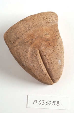 view A clay-baked vulvas. Roman votive offering