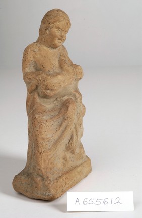 A clay-baked mother and child. Roman votive offering