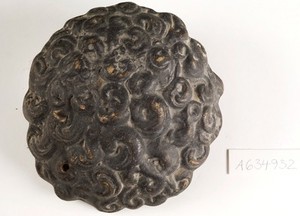 view A clay-baked hair style. Roman votive offering