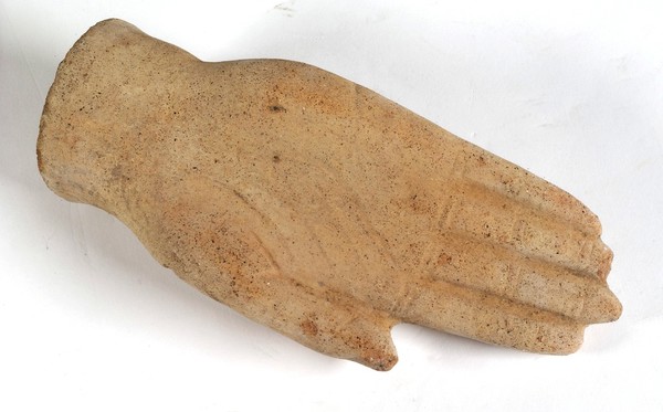 A clay-backed hand. Roman votive offering