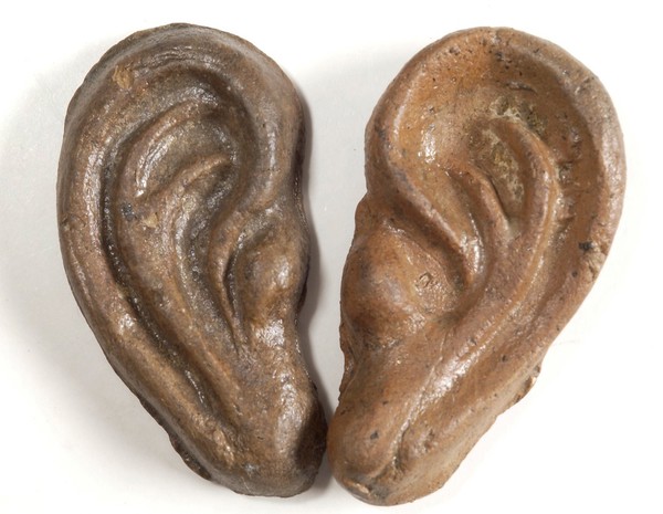 A pair of clay-backed ears. Roman votive offering