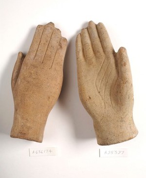 view Two clay-baked hands. Roman votive offering