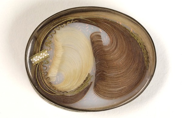 Mourning brooche containing the hair of a deceased relative.