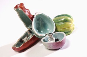 view Porcelain fruit containing couple engaged in sexual foreplay