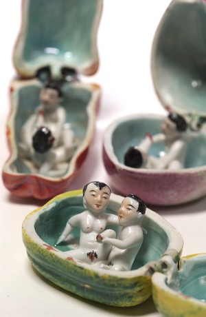 view Porcelain fruit containing couple engaged in sexual foreplay