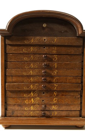 Oak metaria medica chest with drawers containing animal, vegetable and mineral specimens. Dutch.