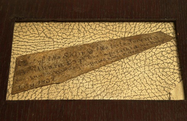 An inscription fragment of human skin, said to that of the philosopher Jeremy Bentham, dissected in London, 1832