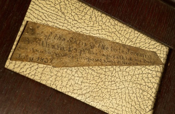 An inscription fragment of human skin, said to that of the philosopher Jeremy Bentham, dissected in London, 1832
