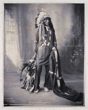 view Keeps the Mountain, a Sioux. Platinum print by F.A. Rinehart, 1898.