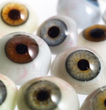 A selection of glass eyes from an opticians glas eye case. Possibly made by E. Muller of Liverpool.