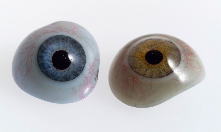 A selection of glass eyes from an opticians glas eye case. Possibly made by E. Muller of Liverpool.