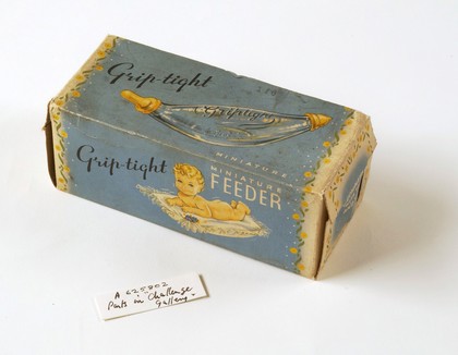 Glass infant's bottle(original box) - the 'Grip-tight miniature feeder'.