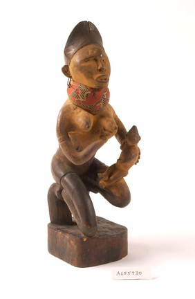 Carved wooden figure of woman with child