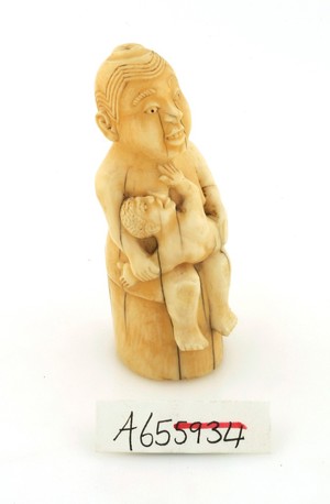 view Ivory effigy of mother and child