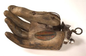 view Artificial right hand, Aluminium with hard rubber cover. From Aberdeen Hospital, Scotland.