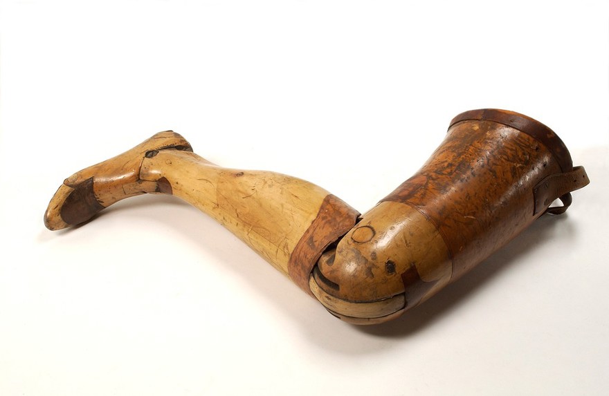 Artificial left leg with thigh socket for amputation above the knee.