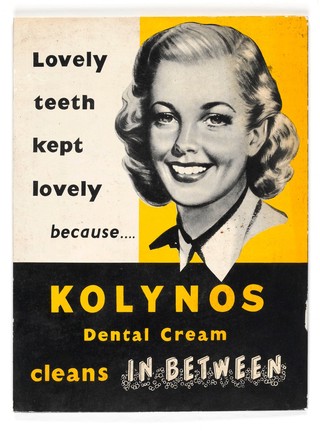 Lovely teeth kept lovely because.... Kolynos dental cream cleans in between.