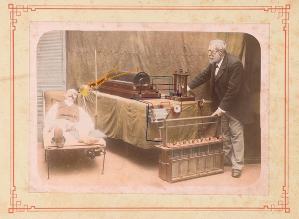 Arthur Radiguet making a radiograph (x-ray) of a recumbent man. Photograph by Radiographie Radiguet, ca. 1898.