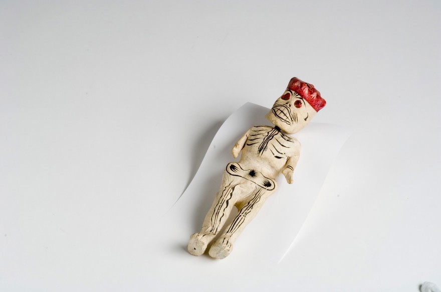A human skeleton with a red hat. Papier mâché sculpture by a Mexican artist, 1975.