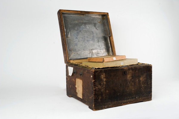 One of the chests which the photographer John Thomson (1837-1921) used to carry his glass negatives. Wood and metal, 18--.