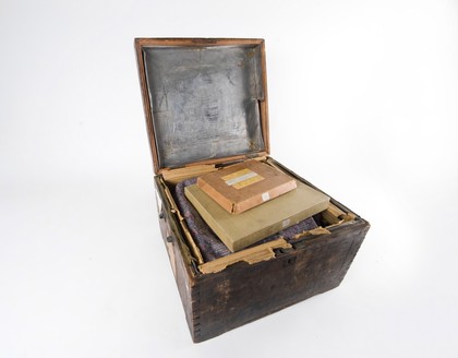 One of the chests which the photographer John Thomson (1837-1921) used to carry his glass negatives. Wood and metal, 18--.