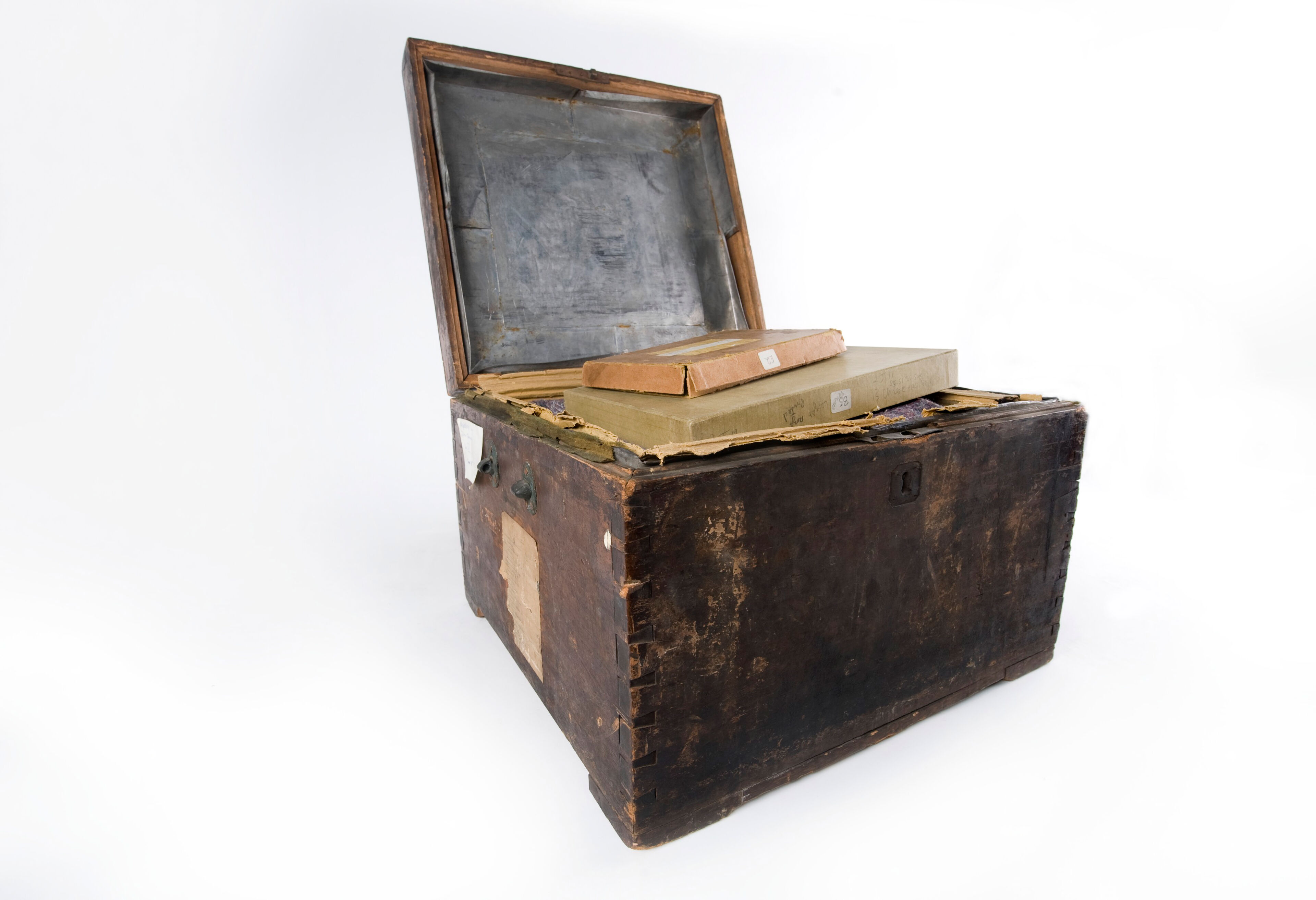 One of the chests which the photographer John Thomson (1837-1921) used to carry his glass negatives. Wood and metal, 18--.