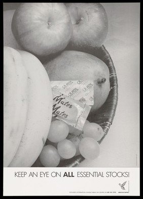 Two packs of condoms sit amongst a bowl of fruit representing an advertisement for the Brent HIV Centre. Black and white lithograph.