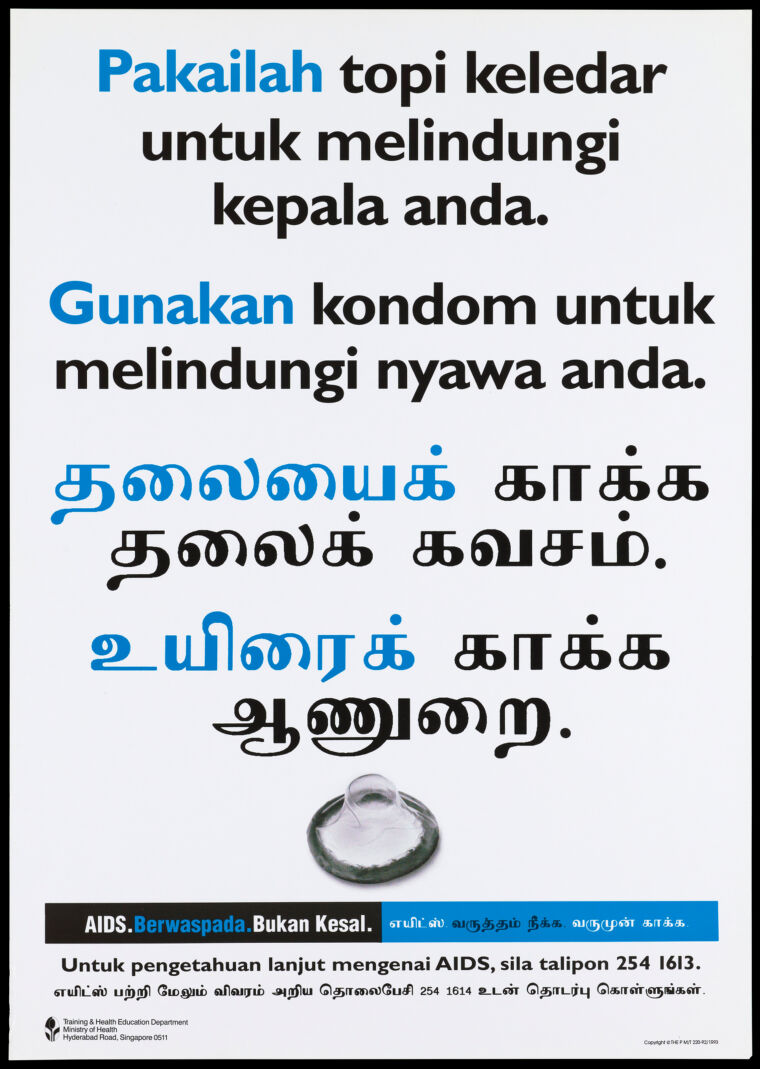 A condom with a message in Malay and Tamil (?) about safe sex and the