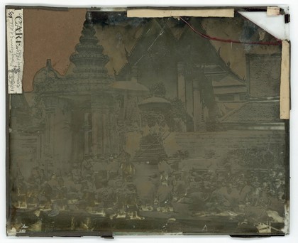 King Mongkut of Siam [Thailand] arriving at the Temple of the Reclining Buddha (Wat Pho) for the ceremony of the Lenten Robes. Photograph by John Thomson, 1865.