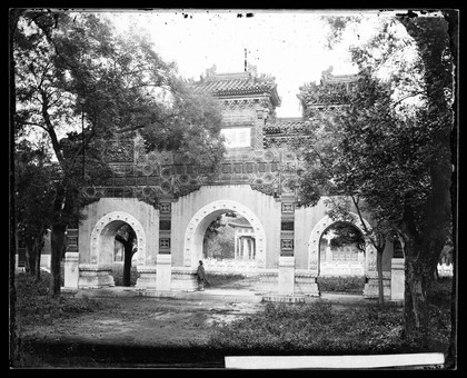Hall of Classics (Guozijian), Peking: a triple archway of sculpted marble leading to the hall. Photograph by John Thomson, 1871.