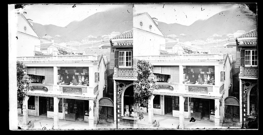 Queen's Road west, Hong Kong. Photograph by John Thomson, 1868/1871.