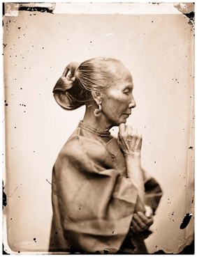 Canton, Kwangtung province, China: an old woman. Photograph by John Thomson, 1869.