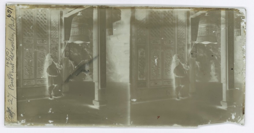 Fangguangyan monastery, Fujian province, China: a monk ringing the bell. Photograph by John Thomson, 1870-1871.