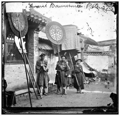 Peking, Pechili province, China: hired bannermen in a Manchu funeral procession. Photograph by John Thomson, 1869.