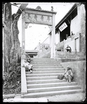 Canton (Guangzhou), Kwangtung (Guangdong) province, China: ancient Chuting stone memorial arch, Yuexiu mountain. Photograph by John Thomson, 1871.