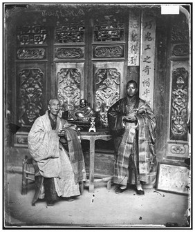 Fangguangyan monastery, Fujian province, China: two Buddhist priests. Photograph by John Thomson, 1870-1871.