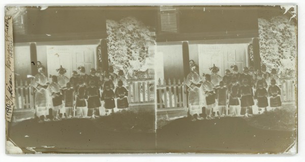 Fukien province, China: women and children outside a school (?). Photograph by John Thomson, 1871.