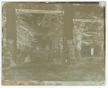 Biyunsi (Temple of Azure Clouds), Beijing: the Jingangta (Diamond Sutra Pagoda), viewed through a memorial arch. Photograph by John Thomson, 1871.