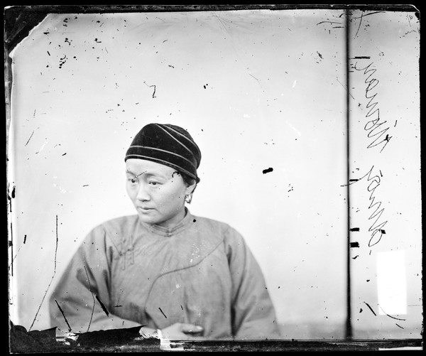 Shanghai, China: a woman wearing a velvet snood. Photograph by John Thomson, 1869.