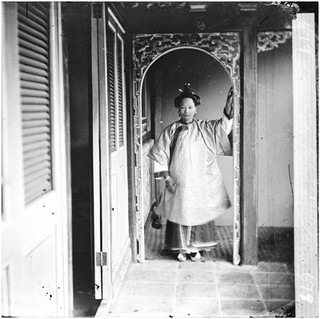 Canton (Guangzhou), Kwangtung province, China: a Cantonese woman. Photograph by John Thomson, 1869.