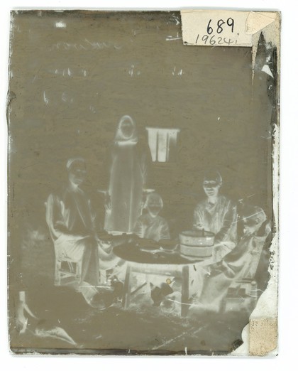 Kowloon, Hong Kong, China: a Chinese family. Photograph by John Thomson, 1869.