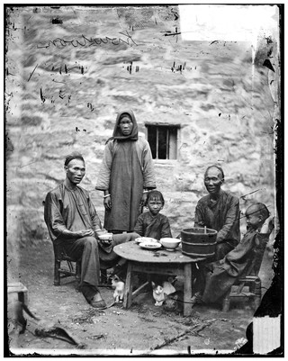 Kowloon, Hong Kong, China: a Chinese family. Photograph by John Thomson, 1869.