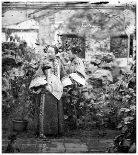 China: a Manchu lady with her maid, Beijing. Photograph by John Thomson, 1869.
