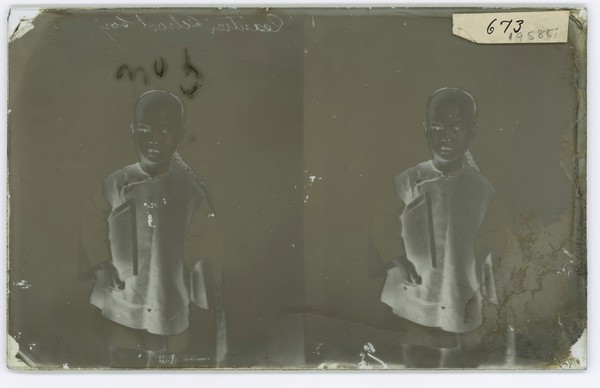 Canton (Guangzhou), Kwangtung province, China: a schoolboy. Photograph by John Thomson, 1869.