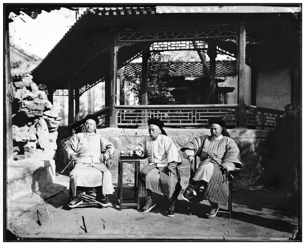 Peking, Pechili province, China: three Manchu Ministers at the Office of Foreign Affairs, late Qing. Photograph by John Thomson, 1869.